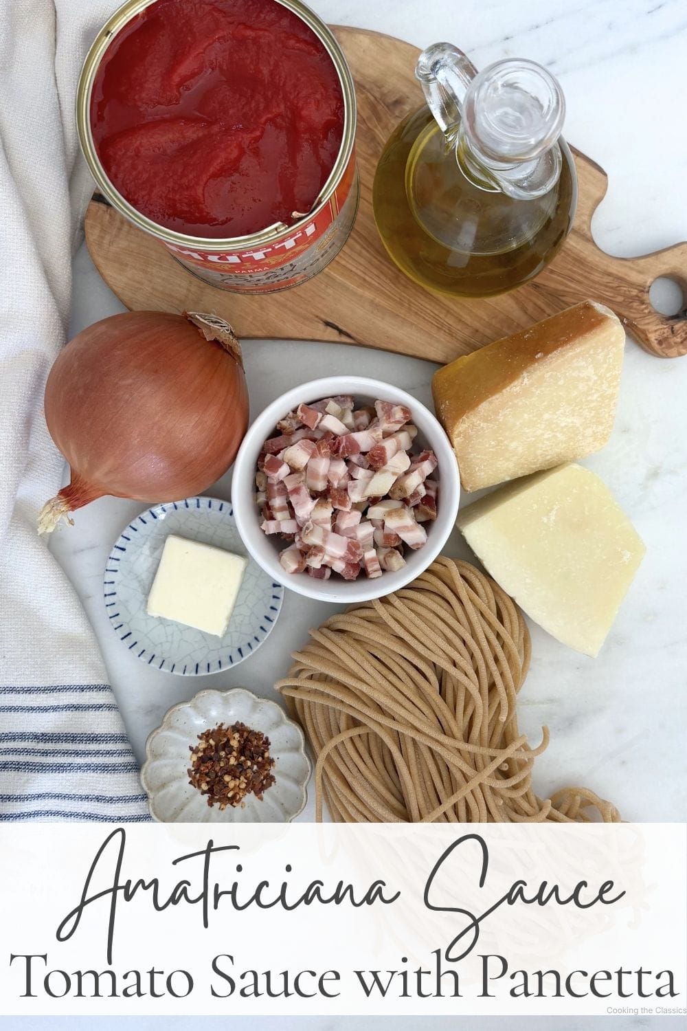 Ingredients for Marcella Hazan's Amatriciana sauce including tomatoes, pancetta, onion, Parmigiano-Reggiano, Romano cheese, bucatini, butter, and red pepper flakes.