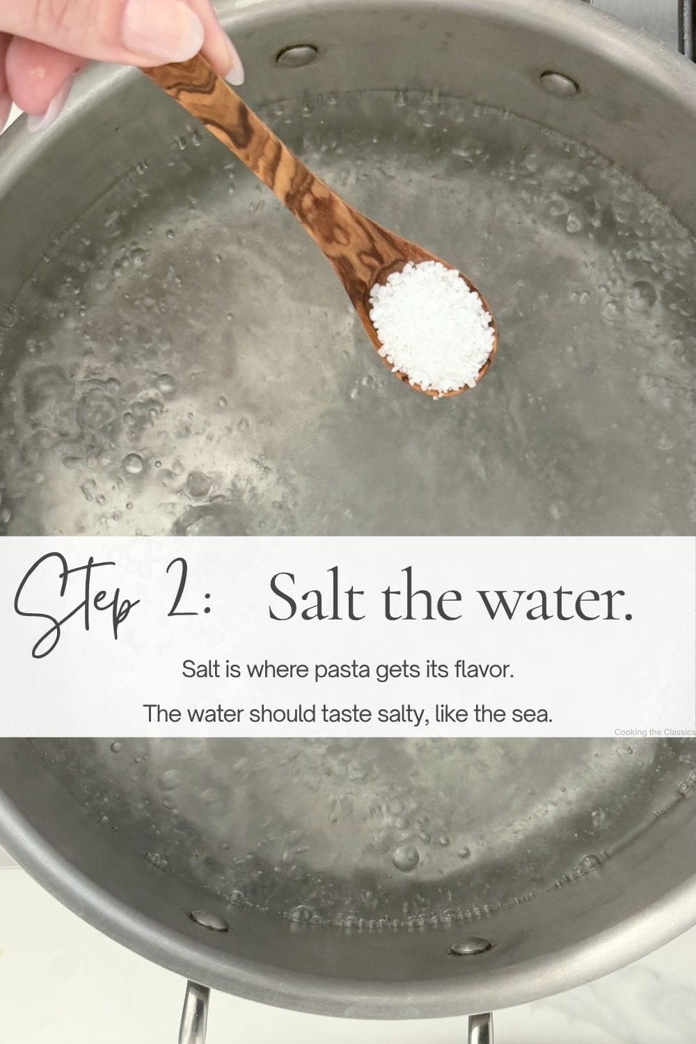 Olive wood spoon holding coarse salt above a pot of boiling water with instructions to salt pasta water generously.