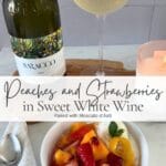 Peaches and strawberries in sweet white wine served with vanilla ice cream alongside a bottle and glass of Moscato d’Asti.